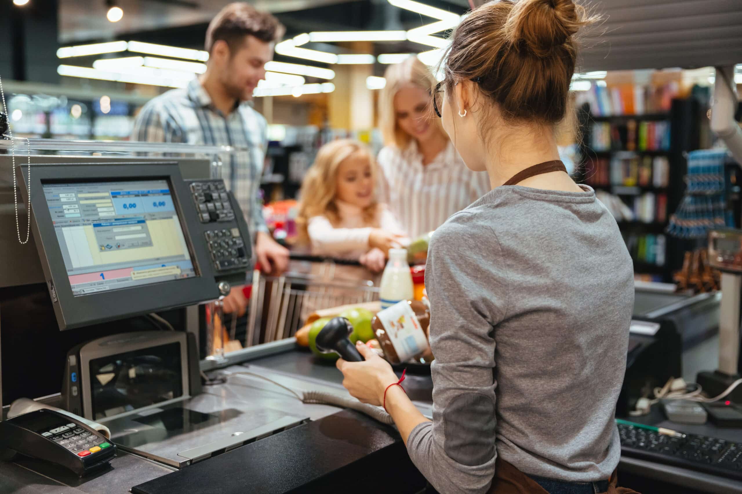 beautiful-family-standing-cash-counter-1-scaled